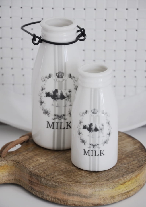 Małe dekkoracyjne buuteleczki na mleko