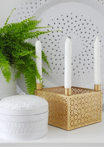 Świecznik z metalu na cztery świece