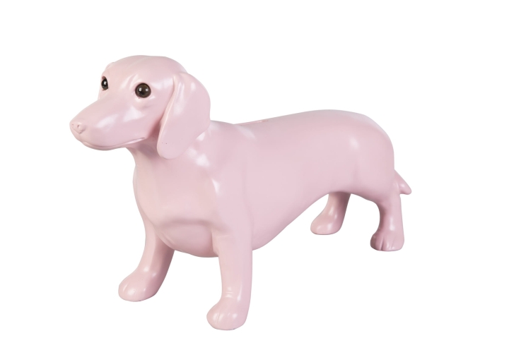 Różowa zabawna skarbonka w kształcie jamnika