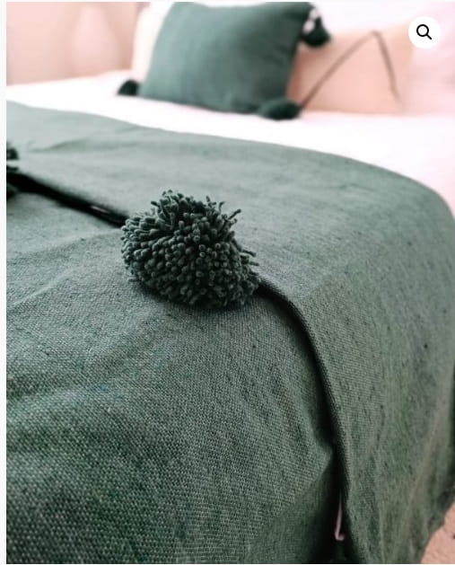 Pled zielony z pomponami z naturalnej ekologicznej bawełny