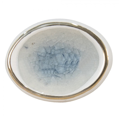 Ceramiczna gałka meblowa z niebieskim środkiem