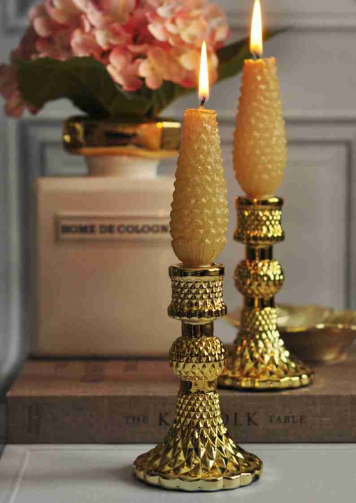 Złoty szklany świecznik w stylu glamour