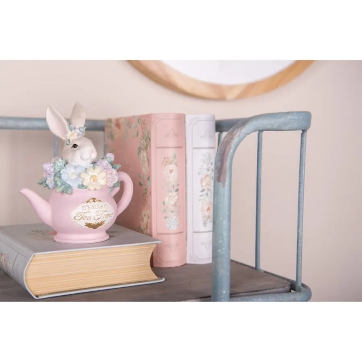 Aurora różowe pudełko z kwiatami na półce w pokoju dziecięcym