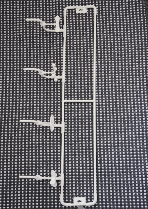 Biały wieszak ścienny do łazienki