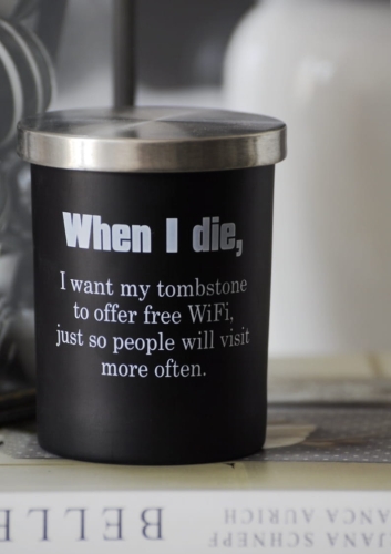 Świeca dekoracyjna w czarnym pojemniku