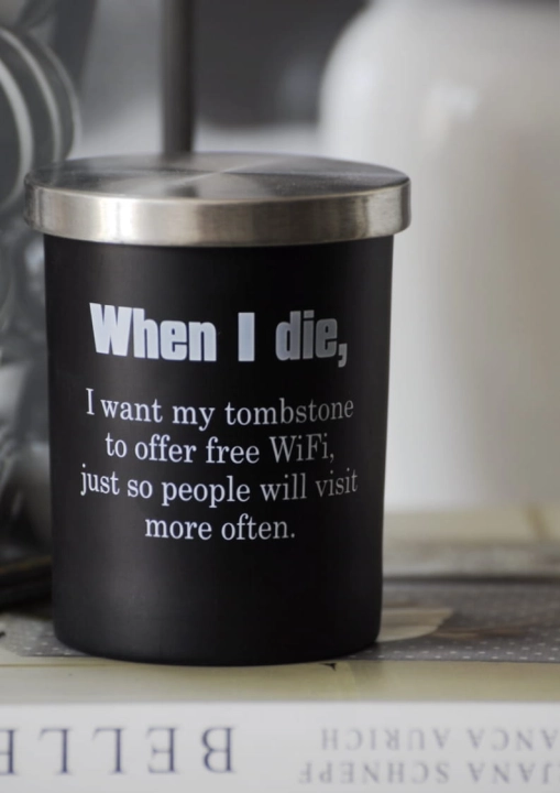 Świeca dekoracyjna w czarnym pojemniku