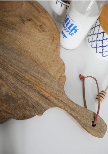 Okragła drewniana deska do krojenia mango z rączką